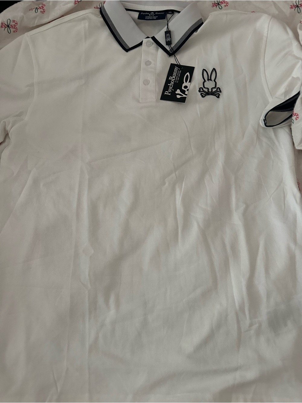 Psycho Bunny White Polo with Black Trim and Embroidered Logo